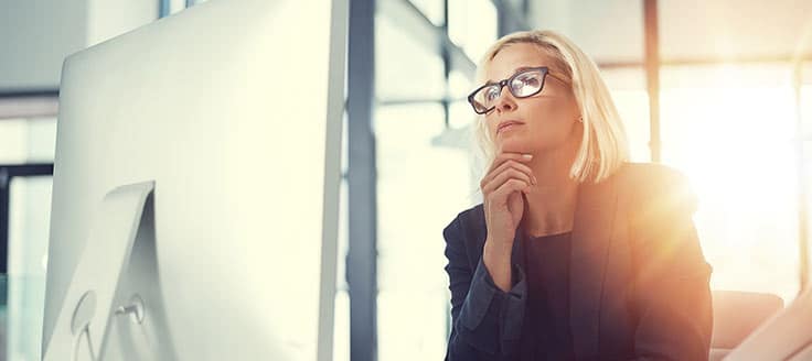 A businesswoman trying to decide which small business consulting firm to choose.