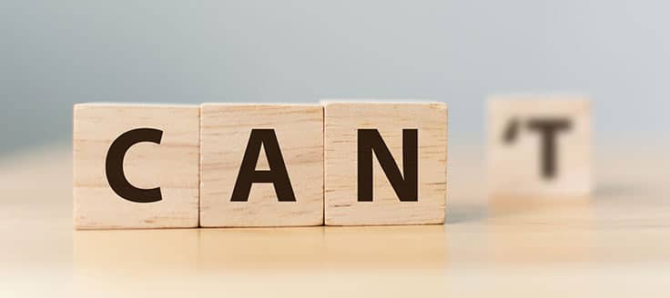 Letter blocks spell out the word “can” while a block with an apostrophe and the letter “T” on it sits in the background. If you decide to hire a CPA, it can be a help to your business.