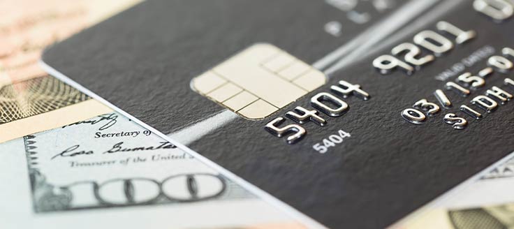 A credit card is on top of 0 bills. A business credit card with cash back rewards might be a good business investment.