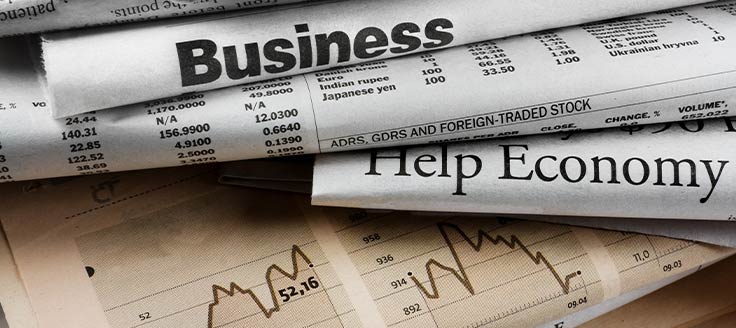 A stack of stock reports resting on a table.