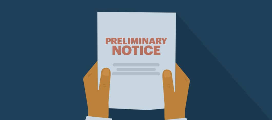 Two hands hold up a sheet of paper on each side. It reads “Preliminary Notice.”