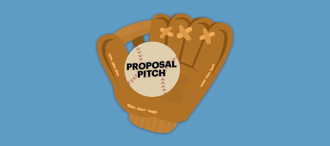 This is a close-up of a baseball glove that caught a baseball labeled “Proposal Pitch.”