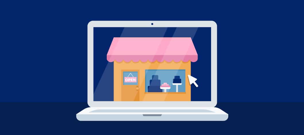 The screen of a laptop computer displays an image of a small shop.