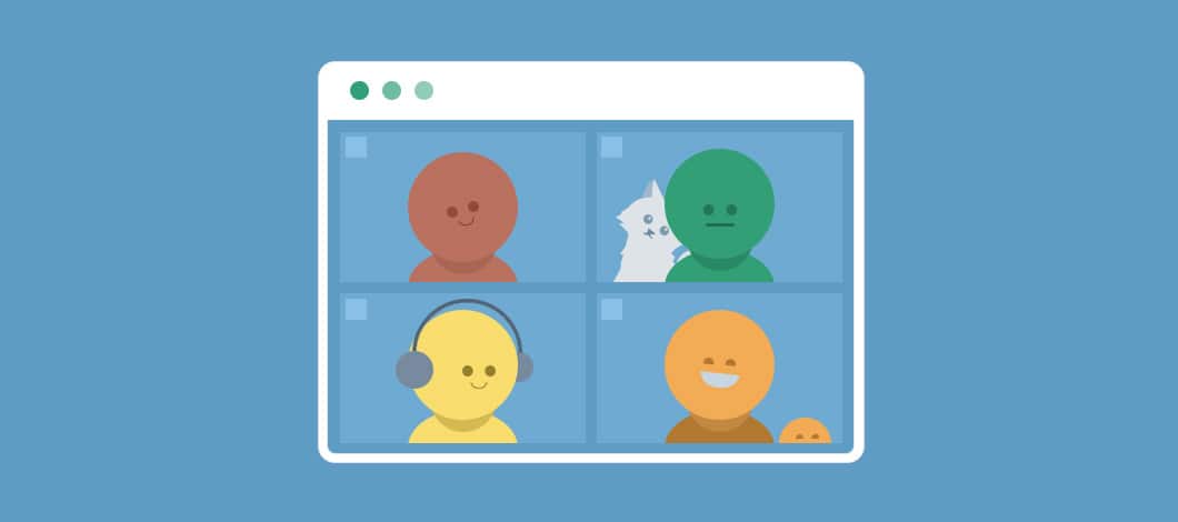 A computer monitor shows a video conference of four people who are working from home.