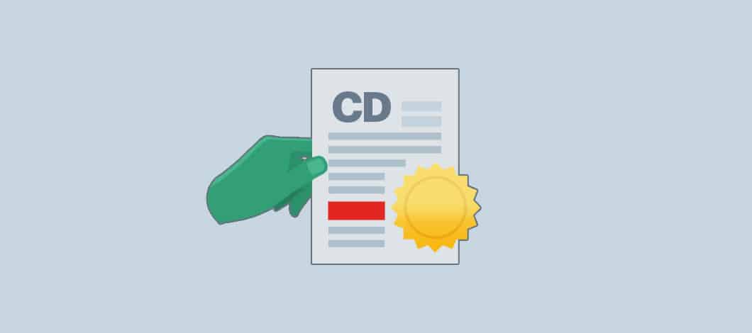 A hand holds a certificate that reads “CD” and has a circular gold emblem on the lower right corner.