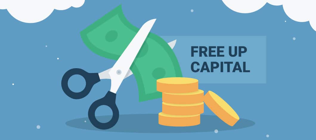 Graphic of scissors cutting up a dollar bill and the words “free up capital” next to it